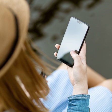 a woman's holding a phone