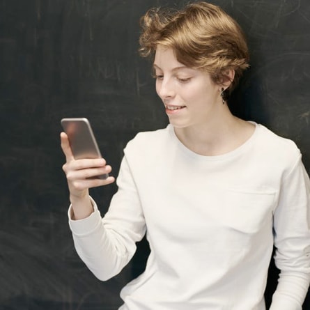 a woman's holding a phone